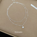 Layered Silver Tone Open Star and Crystal Star Necklace view 4
