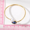 Gold and Silver Tone Blue Evil Eye Faux Pearl Open Cuff Bracelets view 4
