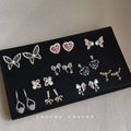 CZ Pavé Bow Butterfly Heart Flower Teardrop Stud Earrings view 1
