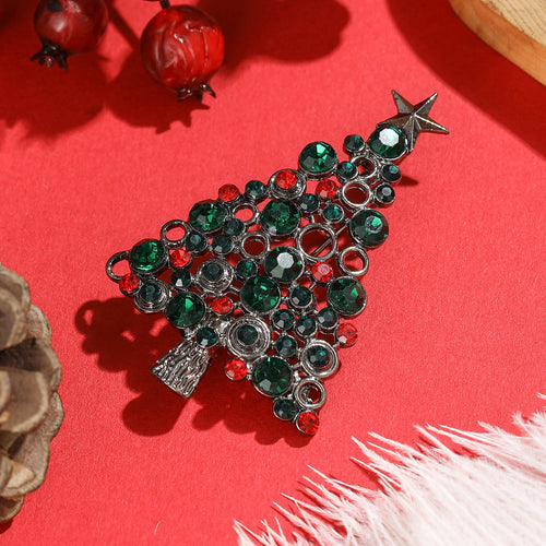 Christmas tree brooch close-up star and crystals