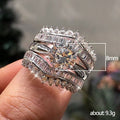 Wide Curved Baguette And Round Stone Ring Set In Silver Tone view 4