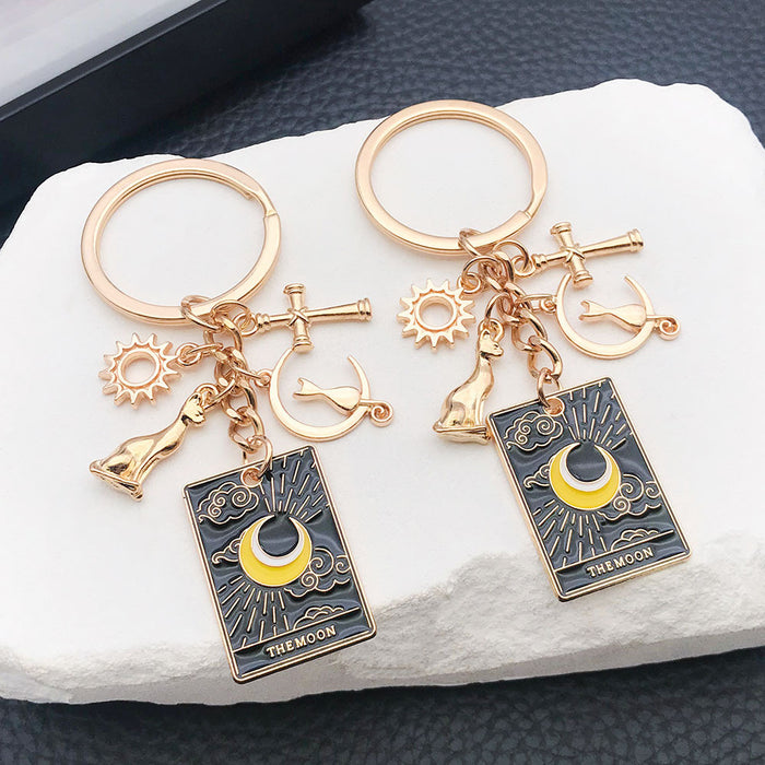 Black Celestial Tarot Cat and Moon Charm Keychain Pair with Gold Tone Hardware