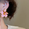 Pink Enamel Lily Flower Stud Earrings With Gold Trim view 3