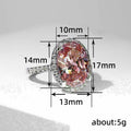 Pink Oval Solitaire Halo Ring In Polished Silver Tone view 5