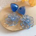 Blue Resin Flower Drop Earrings With Polished Metal Details view 4