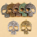 Large Floral Engraved Skull Metal Charm in Eight Finishes view 1