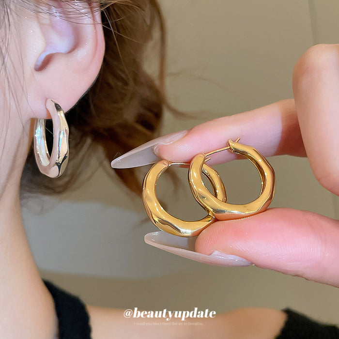 Rounded Sculpted Hoop Earrings In Gold And Silver Tones