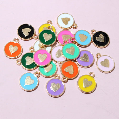 Enamel heart charms showing assorted shapes and finishes