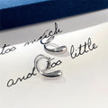 Silver Tone Sculptural Swirl Cuff Earrings with Polished Finish view 2