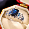 Rectangular Solitaire Geometric Ring In Five Center Colors view 1