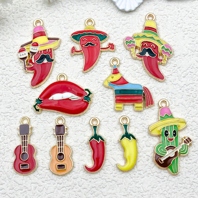 Colorful chili pepper charms arranged on a light background