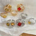 Gold Textured Heart Open Ring Four Piece Red Amber Set view 1