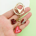 Flower Charm Keychains Featuring Red Balloon Across 43 Pictured Variations view 1