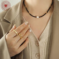 Black Glass Bead Necklace White Pearl Center Gold Accents view 3