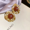 Round Enamel Statement Stud Earrings With Wavy Gold Tone Frames view 6