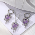 Silver Tone Melting Heart Necklace and Huggie Earring Options view 2
