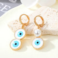 Gold Tone Asymmetric Pearl and Evil Eye Huggie Drop Earrings view 3