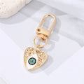 Gold Tone Enamel and Crystal Heart Evil Eye Clip Keychains view 2
