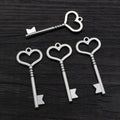 Long Heart Bow Key Pendants in Two Antique Metal Finishes view 7