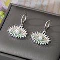 Gold and Silver Tone Crystal Pearl Evil Eye Huggie Earrings view 9