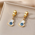 Gold Tone Mother of Pearl Evil Eye Huggie Drop Earrings view 9