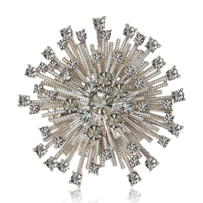 Front view of round starburst composed of radiating rows of clear stones