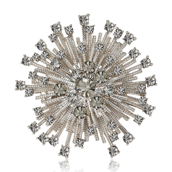 Silver Tone Starburst Brooch with Radiating Clear Crystals