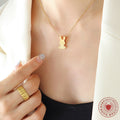 Gold Sitting Bunny Pendant Necklace on Fine Cable Chain view 3