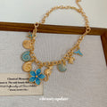 Gold Tone Ocean Charm and Flower Chain Necklaces Statement Jewelry view 4