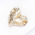 Red Pave Crystal Asymmetric Heart Brooch in Gold Tone view 4