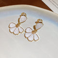 White Enamel Flower Drop Stud Earrings with Gold Tone Edges view 6
