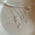 Silver Tone Flower Y Necklace With a Delicate Crystal Drop view 2