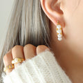 Gold U-Shape Hoop Earrings White Faux Pearl Accents view 3