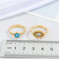 Gold Tone Multicolor Lash and Round Blue Evil Eye Adjustable Rings view 4