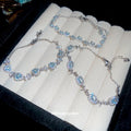 Three Pale Blue Crystal Bracelets With Oval Heart Or Mixed Centers view 4