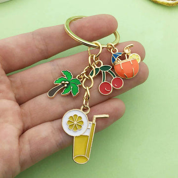 Gold-Tone Fruit And Drink Charm Keychain With Palm Tree And Cherries
