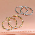 Irregular Twisted Large Hoop Earrings In Gold And Silver Tone view 1
