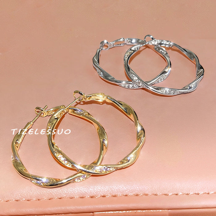 Irregular Twisted Large Hoop Earrings In Gold And Silver Tone