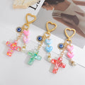 Resin Heart Cross Keychain with Evil Eye Charm and Faux Pearl view 1