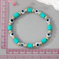 Gold Tone Evil Eye and Polymer Clay Bead Stretch Bracelets view 5
