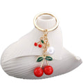 Six-Style Red and Black Cherry Pearl Charm Keychain Collection view 5