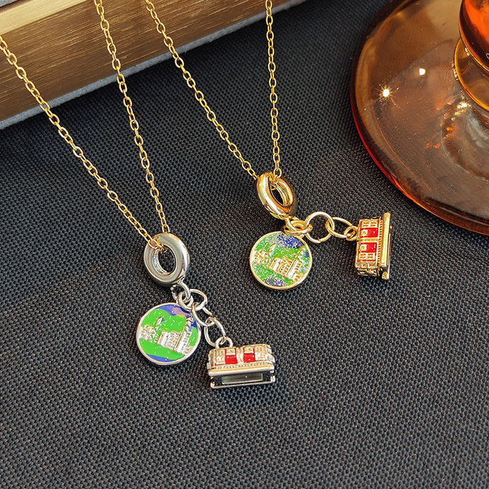 Red Tram and Globe Travel Charm Necklace in Two Metal Tones