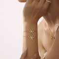 Gold Snowflake Bracelet Clear And Multicolor Zircon Accents view 3