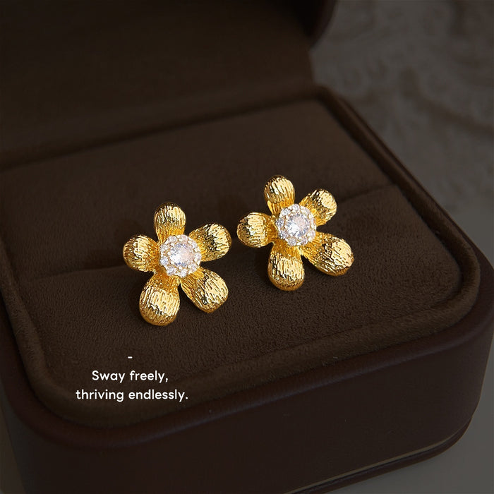 Gold Textured Flower Stud Earrings Clear Crystal Center