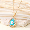 Gold Tone Crystal Halo Teardrop Evil Eye Pendant Necklaces in Four Colors view 6