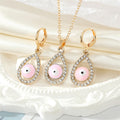 Gold Tone Crystal Teardrop Evil Eye Necklace and Earring Options view 5