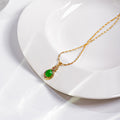 Gold Green Cabochon Teardrop Pendant Necklace Twisted Chain view 1
