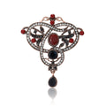 Copper Tone Vintage Openwork Brooch Red Black Stones view 1