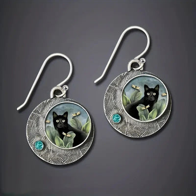 Antique silver black cat cabochon disc earrings on dark gray backdrop