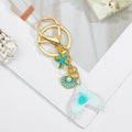 Mermaid Tail Keychain with Starfish and Shell Charms view 3